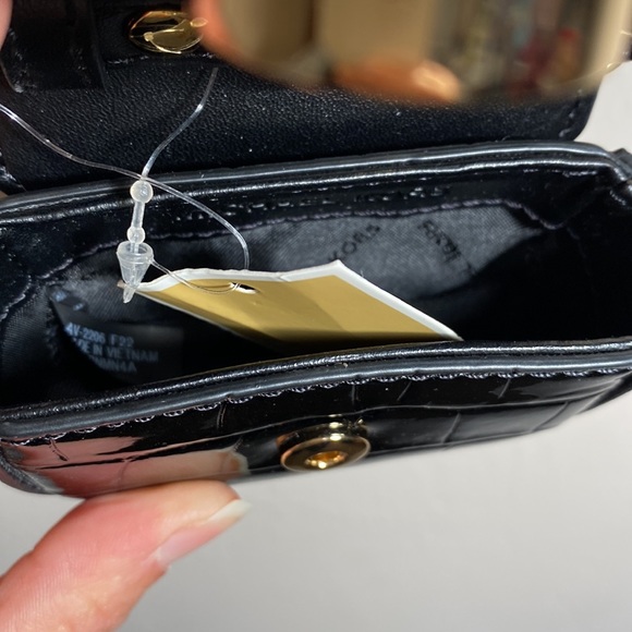 Black patent leather Michael Kors AirPod Pro Case with strap. - Picture 6 of 7